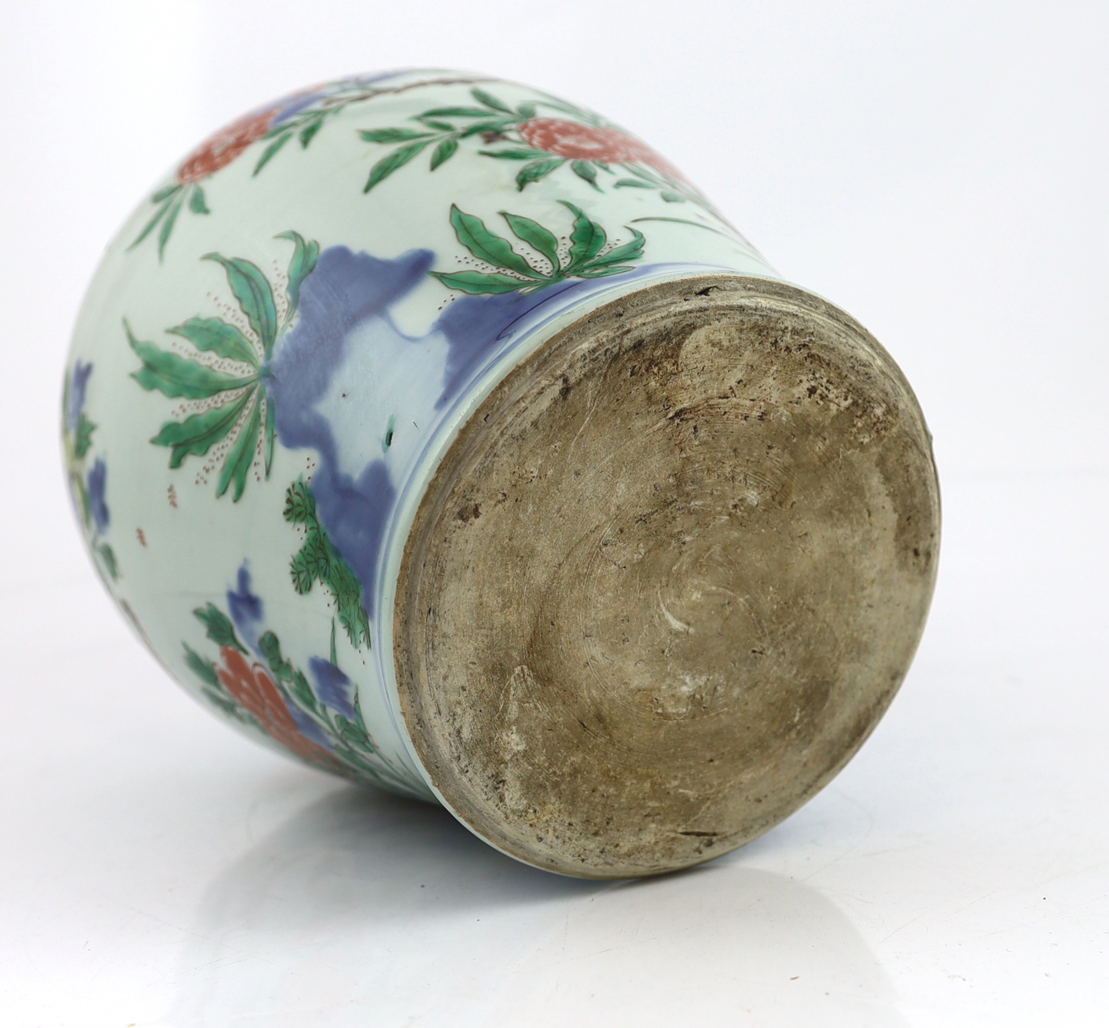 A Chinese wucai ‘rocks and blossom’ vase, Transitional, Shunzhi period, cracked and restoration to neck